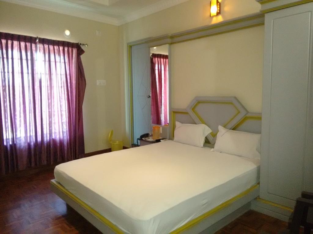 Hotel Chithra Kanyakumari Phòng bức ảnh