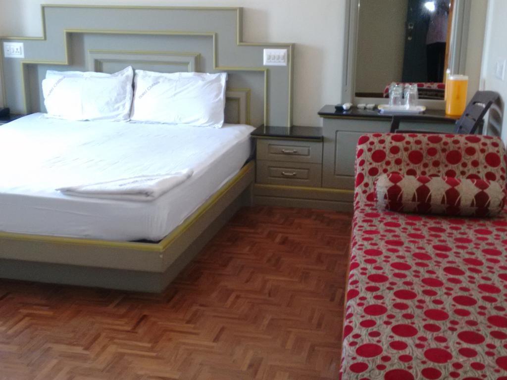 Hotel Chithra Kanyakumari Phòng bức ảnh